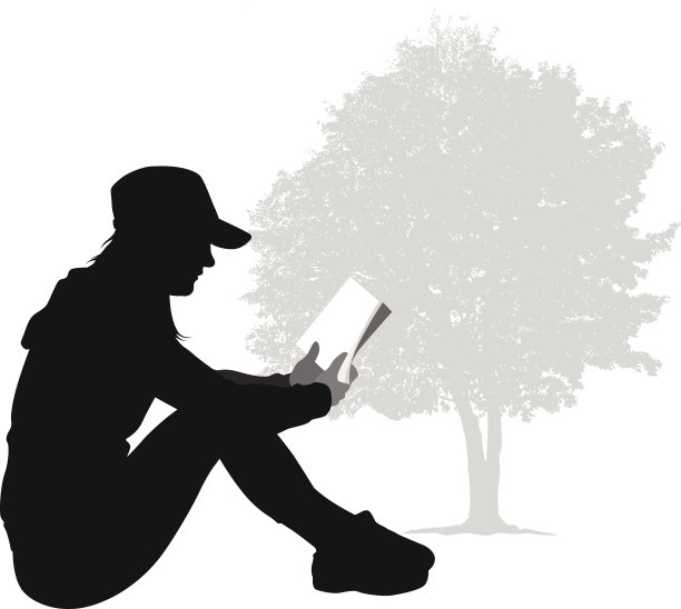 坐在地上看书的剪影图片下载