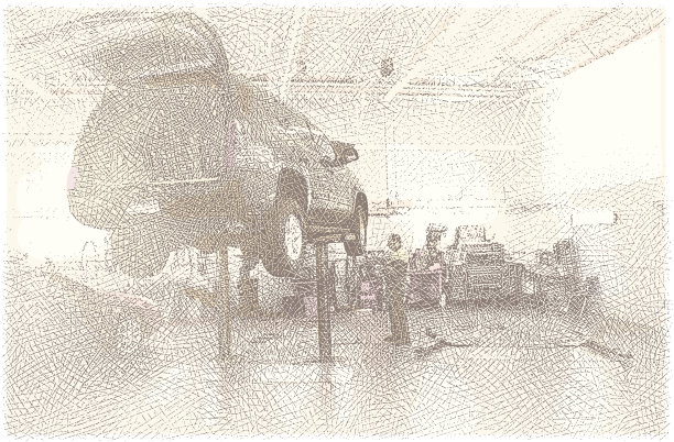 汽车修理工在汽车上工作图片下载