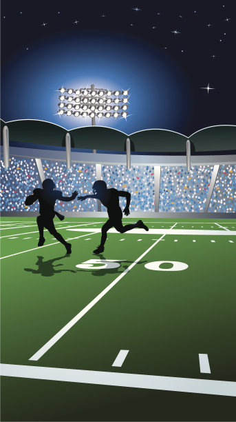 足球背景-球员在体育场灯光下图片下载