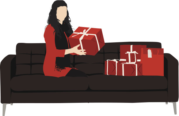 沙发上拿着礼物的女人图片下载