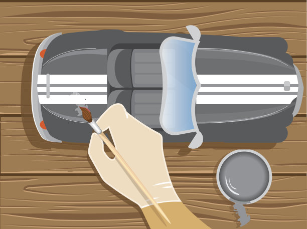 手持画笔的模型车爱好者图片下载