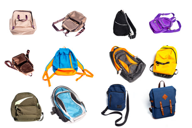 休闲活动的旅行袋和背包。收集书包孤立在白色的背景上。图片下载