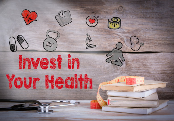 为健康投资。一堆书和一个听诊器图片下载