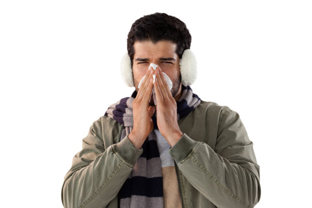 用纸巾擤鼻涕的男人图片下载