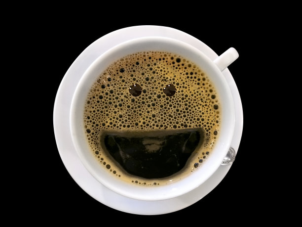 快乐的微笑，形似白杯里的黑咖啡图片下载