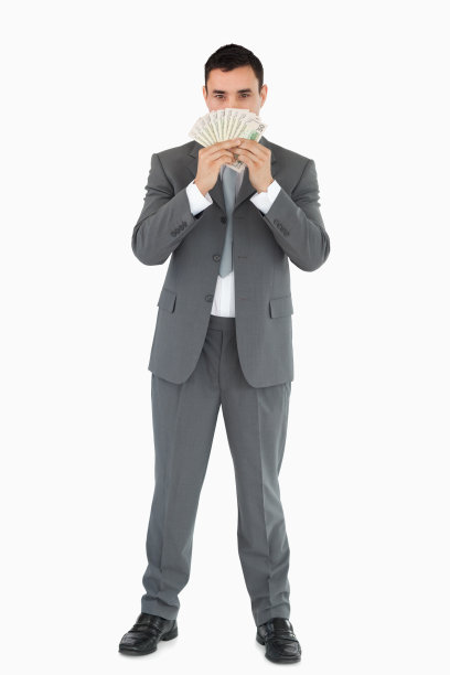 商人闻到钞票图片下载