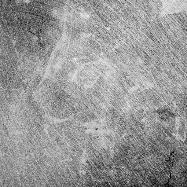 金属上的划痕。黑白背景图片图片下载