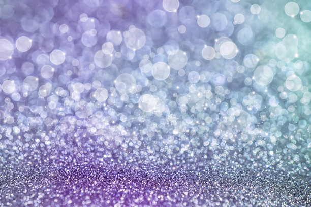 紫色和蓝色的散景灯闪耀背景图片下载