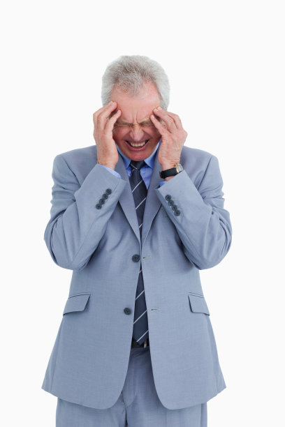 经历头痛的成熟商人图片下载