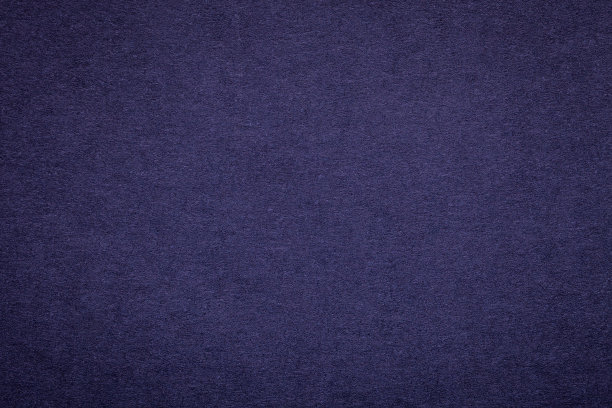 纹理的旧海军蓝纸背景，特写。密实深色牛仔纸板的结构图片下载