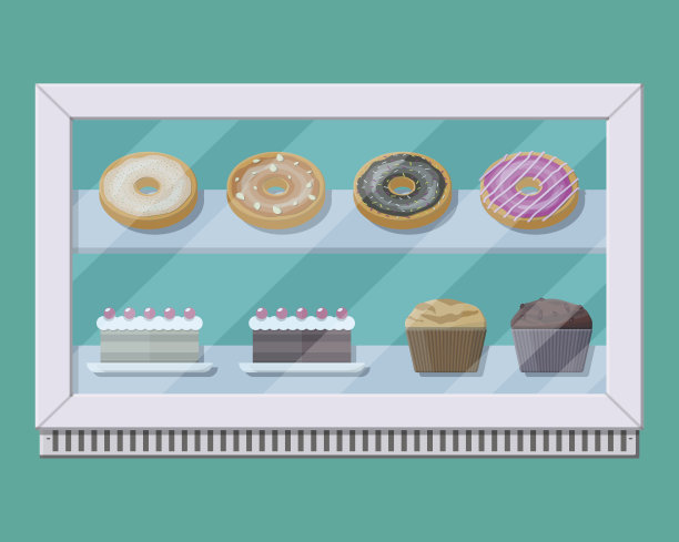 面包店的玻璃冰箱蛋糕和糕点。图片下载