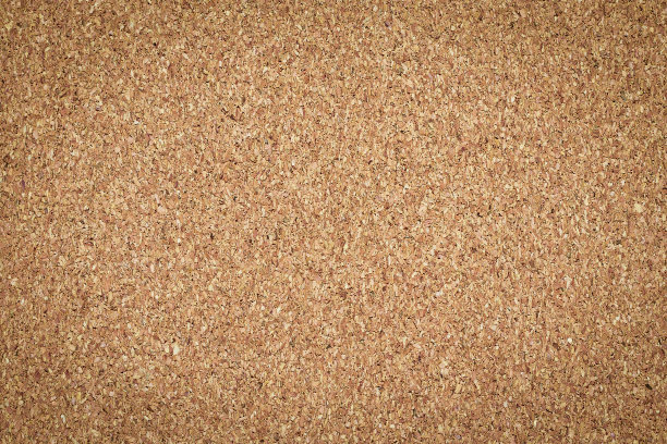 棕色复古软木板纹理背景。空的公告栏素材图片