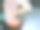 特写女人的手握着她的腰背部疼痛。医疗保健的概念。素材图片