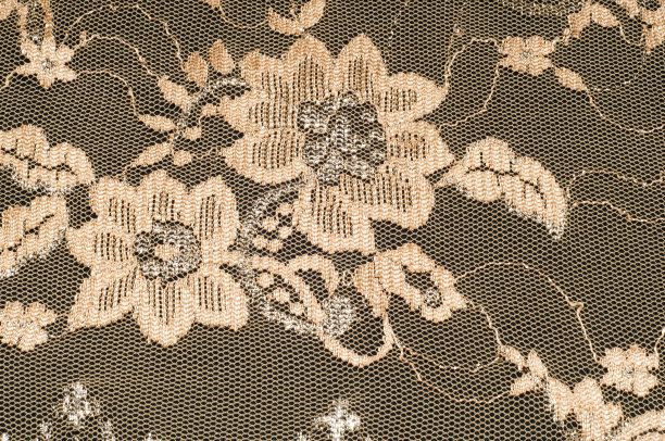 纹理。蕾丝面料在工作室制作金黄色照片图片下载