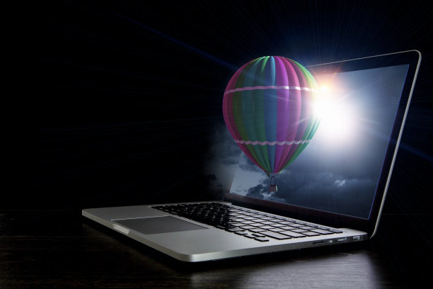 笔记本电脑屏幕上的彩色航空器。混合媒体图片下载