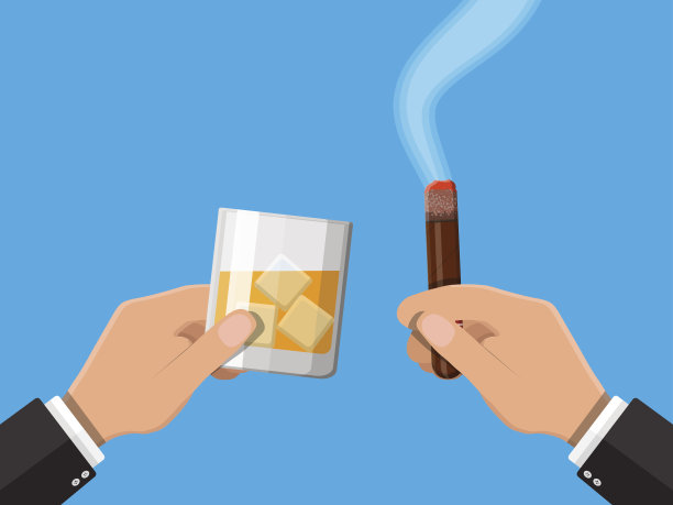 一杯威士忌，手里拿着雪茄。图片下载