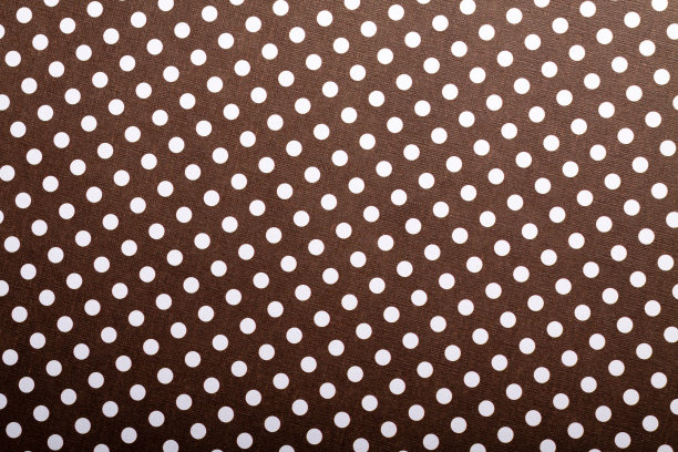 牛皮纸背景上的白点。图片下载