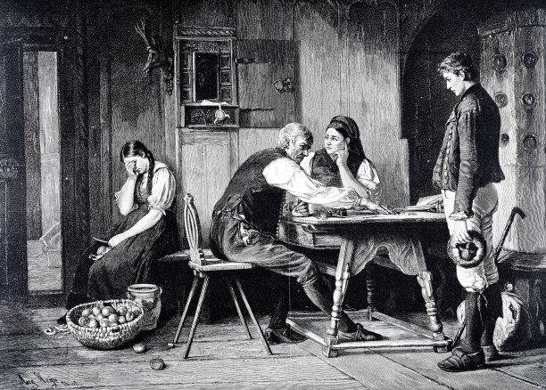 一家人坐在厨房里讨论图片下载