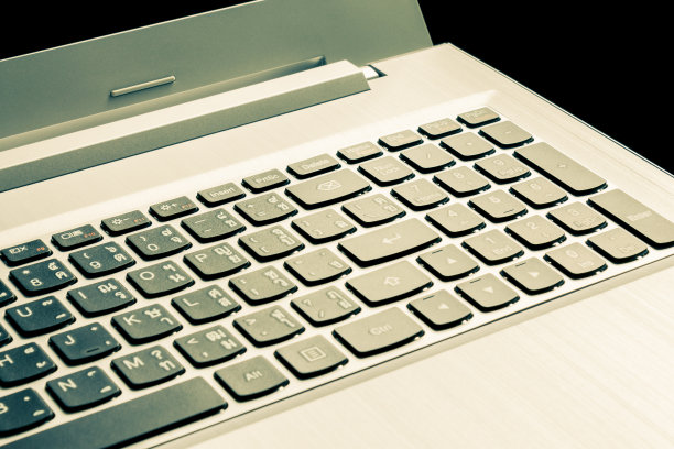 笔记本电脑或笔记本按钮黑色背景复古风格图片下载