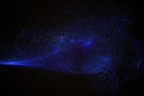 由蓝色发光粒子构成的抽象背景图片下载