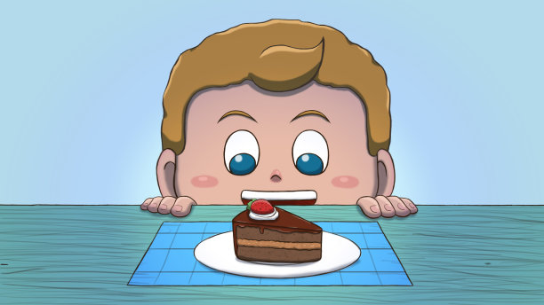 白人男孩看着蛋糕片图片下载