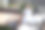 美丽的年轻女子在浴衣坐在阳台上喝咖啡图片下载
