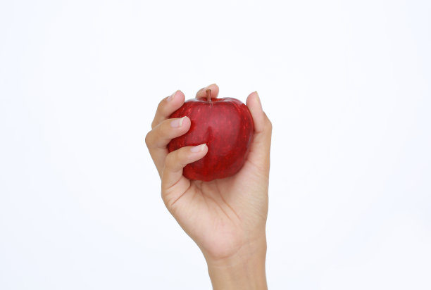 手捧红苹果孤立上白。图片下载