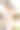 年轻的黑发女子正在厨房里做新鲜的沙拉，并品尝着。家庭主妇手里拿着木勺图片下载