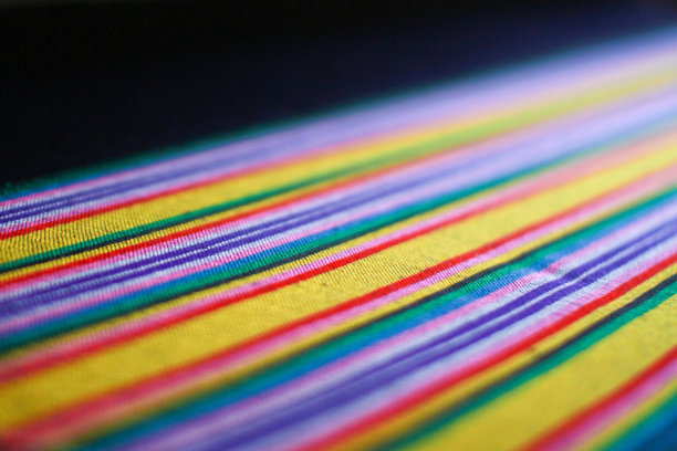 泰国丝绸风格的近距离纹理。泰国织物经典色彩图案图片下载