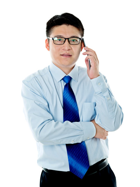 年轻的商人用手机交谈素材图片