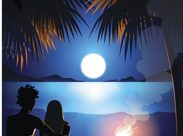 夫妇和篝火在海滩上素材图片