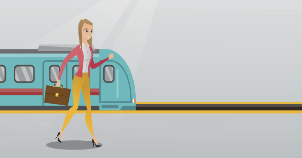 一个年轻女子走在火车站的月台上图片下载