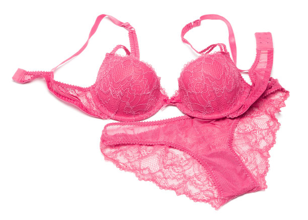 蕾丝内衣设置粉红色的白色背景图片下载