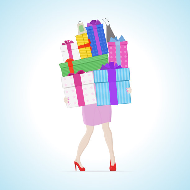 女人提着很多购物袋和礼物。图片下载
