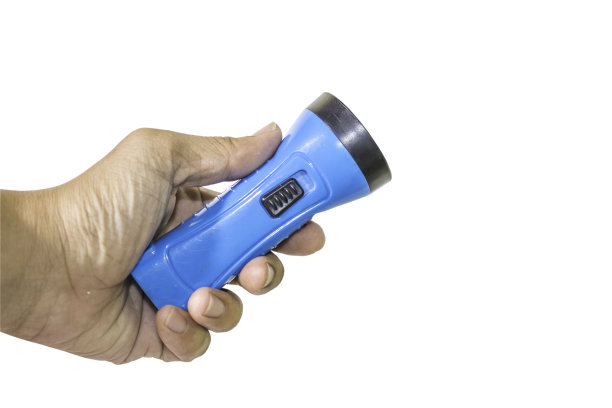 手持手电筒素材图片