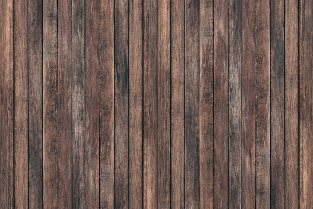 复古的表面木桌和质朴的纹理背景。近距离的深色乡村墙由旧木板制成的木桌纹理。质朴的棕色木桌纹理背景模板为您的设计。素材图片