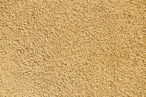 黄色橙色的墙背景纹理。对图形的概念图片下载