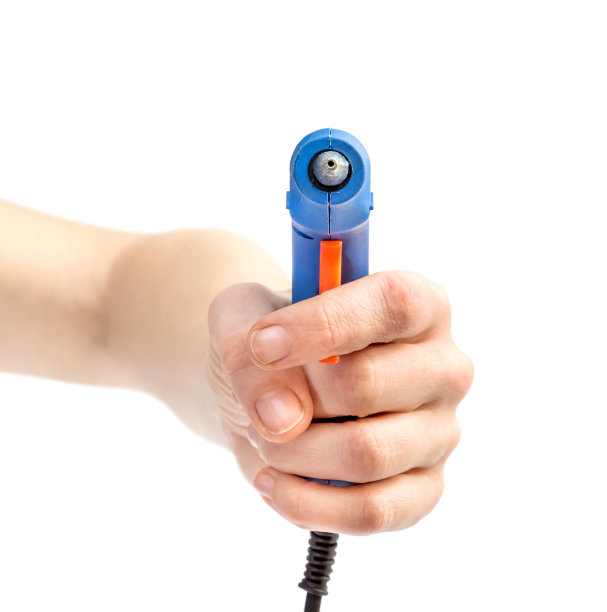 女性手握胶枪。孤立在白色的。图片下载