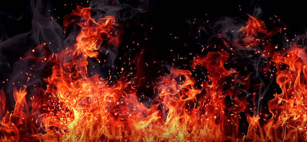 黑色背景上的火的纹理。素材图片