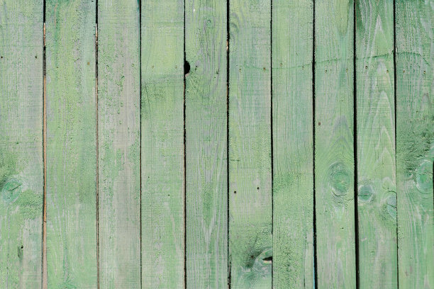 垂直的灰绿色板，褪色的油漆。纹理。背景图片下载