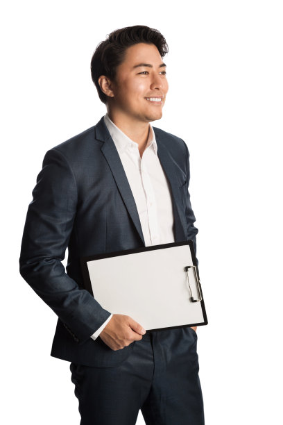 穿着蓝色西装，带着写字板的帅气商人图片下载