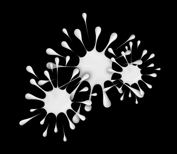 在黑色背景上洒三滴牛奶图片下载