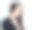 年轻的黑发女人在旗帜背景黑西装图片下载