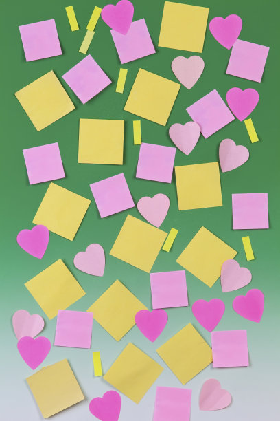 绿色背景的彩色纸张图片下载