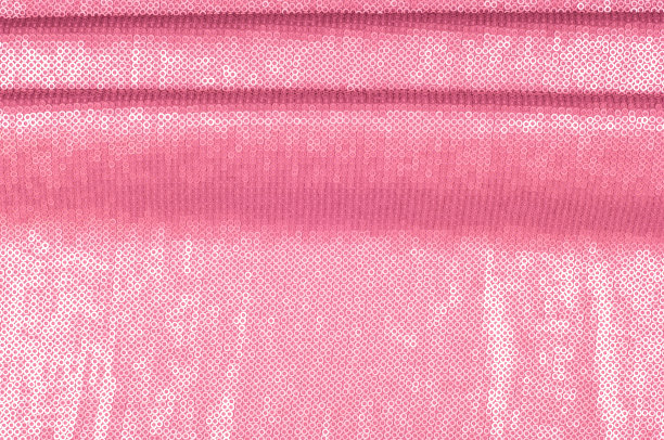 丝织品质地，背景。覆盖着粉红色的亮片图片下载