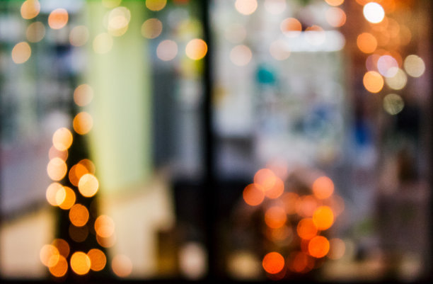 窗中模糊灯光的抽象背景图片下载