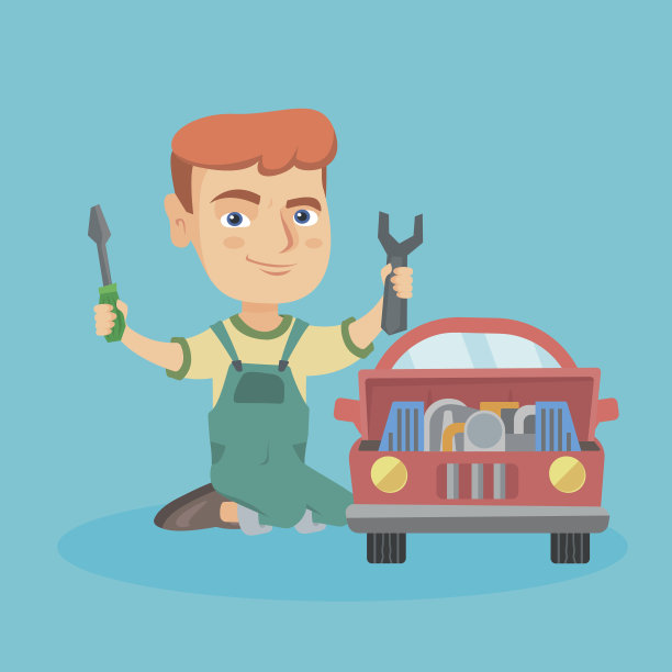 一个白人小男孩在修玩具车图片下载