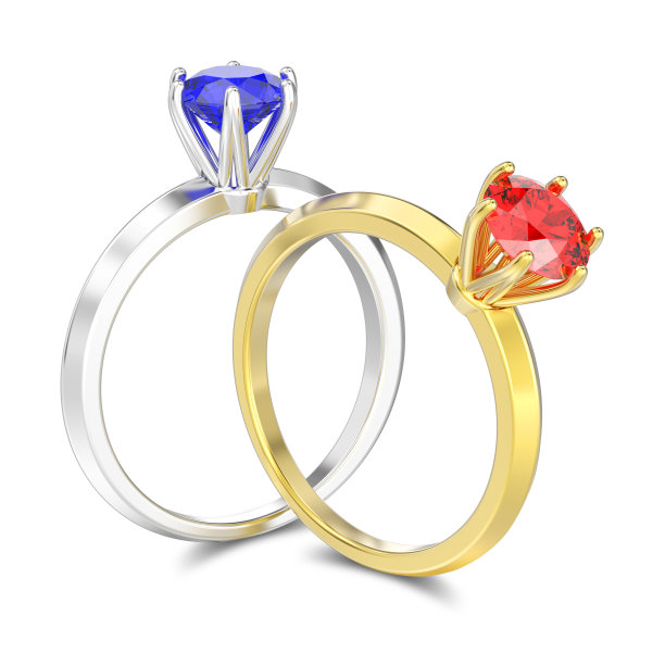三维插图两个孤立的银蓝宝石和金红宝石传统的单人订婚钻石戒指与阴影图片下载