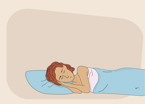 红头发的漂亮女人在睡觉。图片下载