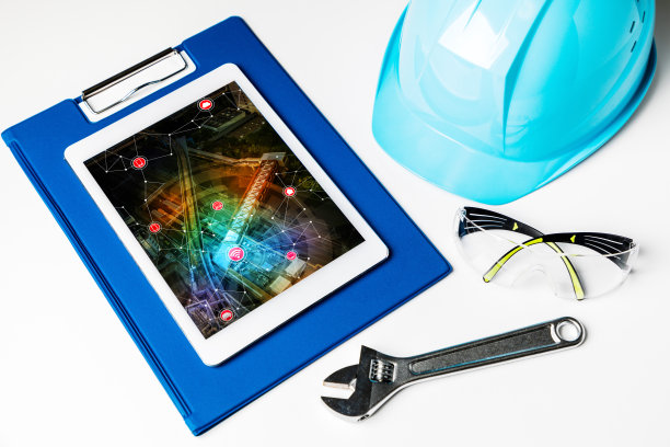 制造业和技术概念。平板电脑和工业工具。图片下载